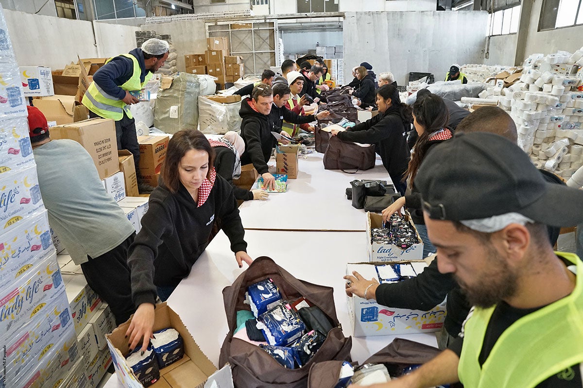 UN Women joins the Jordan Hashemite Charity Organization to pack thousands of dignity kits, including menstrual hygiene products to send to Gaza in February 2024.  The war in Gaza has left Palestinian women and girls in devastation, without access to adequate food, water, sanitation, and hygiene, impacting their mental and physical well-being and dignity. 