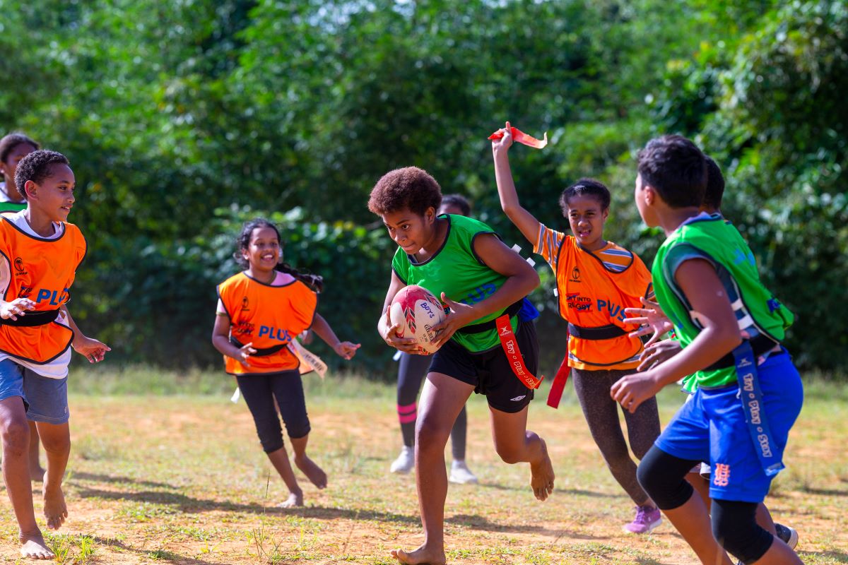 Girls are seen participating in the Get into Rugby PLUS programme in Fiji.