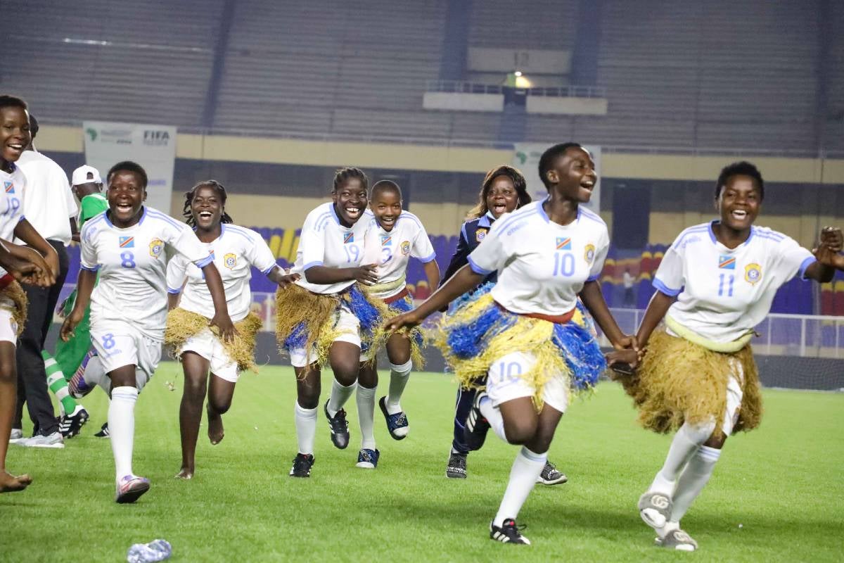 Congolese players celebrate winning the 1st African School Champions Cup organized by FIFA in 2022. Photo: UN Women/Adriana Borra.