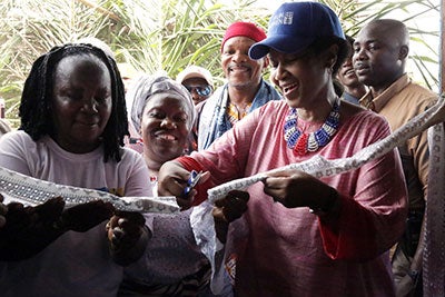 UN Women Executive Director Phumzile Mlambo-Ngcuka rededicated the women’s Peace Hut in Little Bassa, Liberia. Photo: UN Women/Winston Daryoue