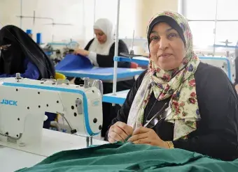 Abeer Abu-Rizeq is seen during a tailoring class at UN Women’s Madaba Oasis Centre. 