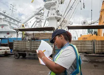 Nicole is one of few women working on the ships and docks at Port Victoria, Seychelles.