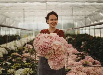 Yuliia Zavalniuk is seen at the Ukrainian flower-growing farm Villa Verde. Photo courtesy of Villa Verde