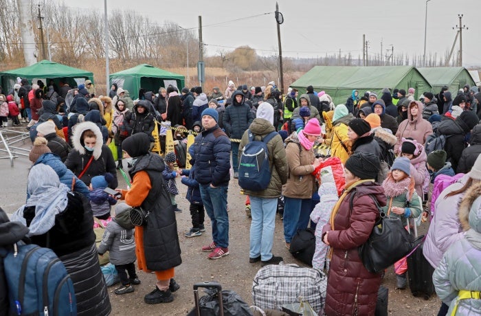 Poste-frontière de Palanca-Maiaki-Udobnoe entre la République de Moldavie et l’Ukraine, le 1er mars 2022. La population fuit l’offensive militaire en Ukraine. Photo : ONU Femmes/Aurel Obreja