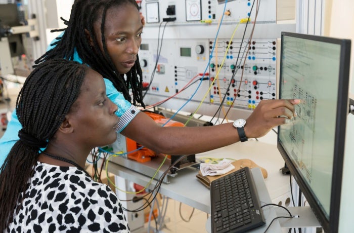 Students in the renewable energy lab at the University of Rwanda. Digital inclusion and literacy skills are critical factors for women’s and girls’ well-being and success. Photo: World Bank/Kelley Lynch