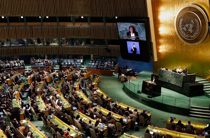 UN Women Executive Director speaks from the podium in the United Nations General Assembly Hall on 11 March 2024.