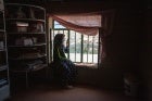 A woman is seen in a bakery in Daikundi, Afghanistan, in May 2022.